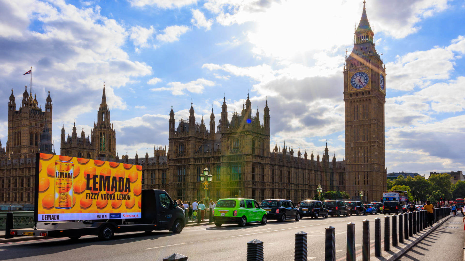 Lemada OOH truck outside the Houses of Parliament, London